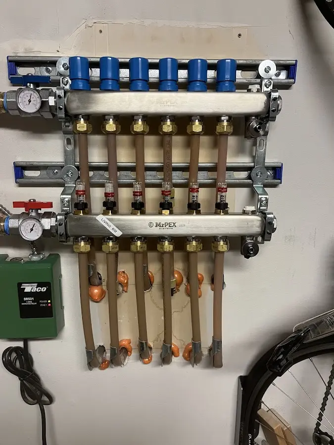 Plumber performing Water Heater Repair at a residential property in Streamwood